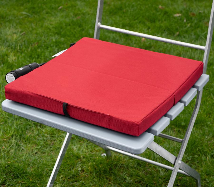 The red heating pad without cable for camping in winter