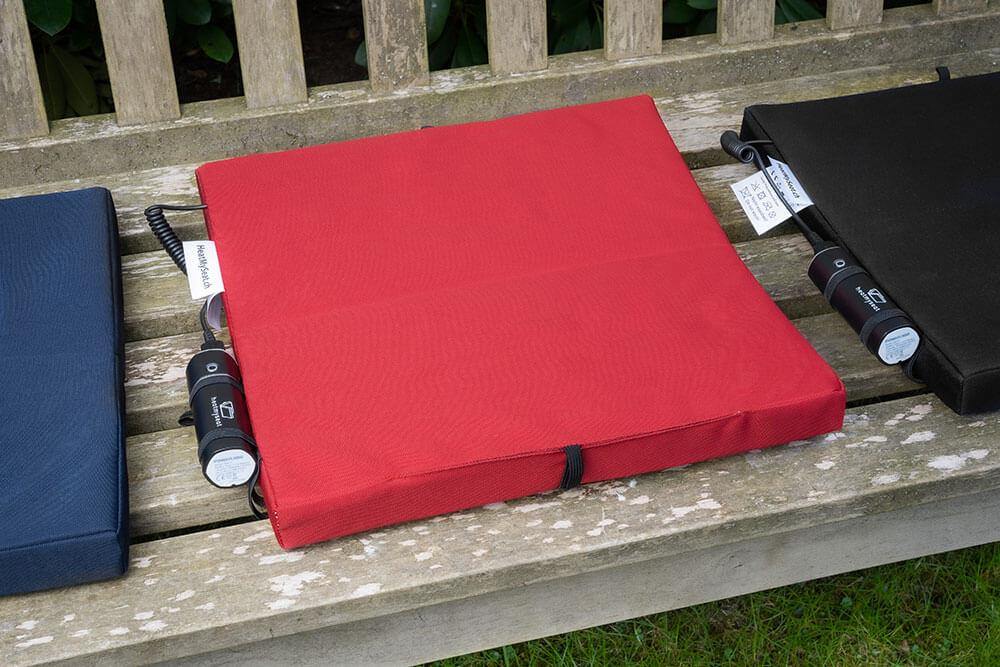 Outchair alternative: The inexpensive heating pad in red. All other colours are available in our shop.